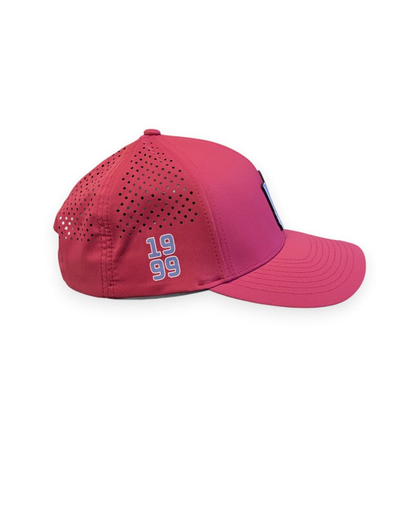 V's Barbershop red performance curved brim hat with laser-cut ventilation and 1999 side embroidery