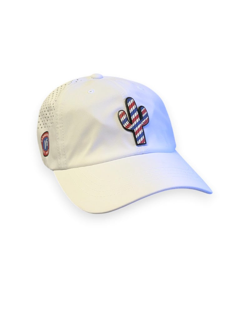 V's Barbershop white dad hat featuring a red, white, and blue barber pole cactus patch and perforated side panels.