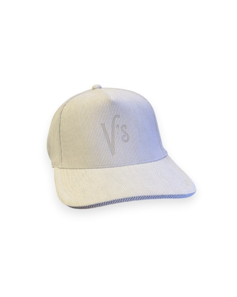 V's Barbershop beige corduroy 5-panel curved brim hat with embroidered V's logo on the front.