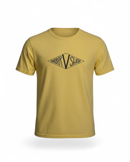 V's Barbershop butter yellow cotton t-shirt with black diamond logo graphic.