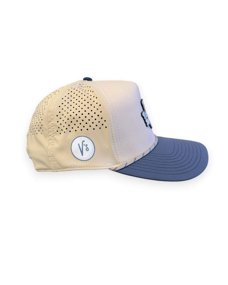 V's Barbershop desert tan and blue curved brim performance hat with laser-cut ventilation and rope detail.