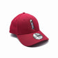 V's Barbershop red baseball cap with embroidered barber pole logo on front. One size fits all.