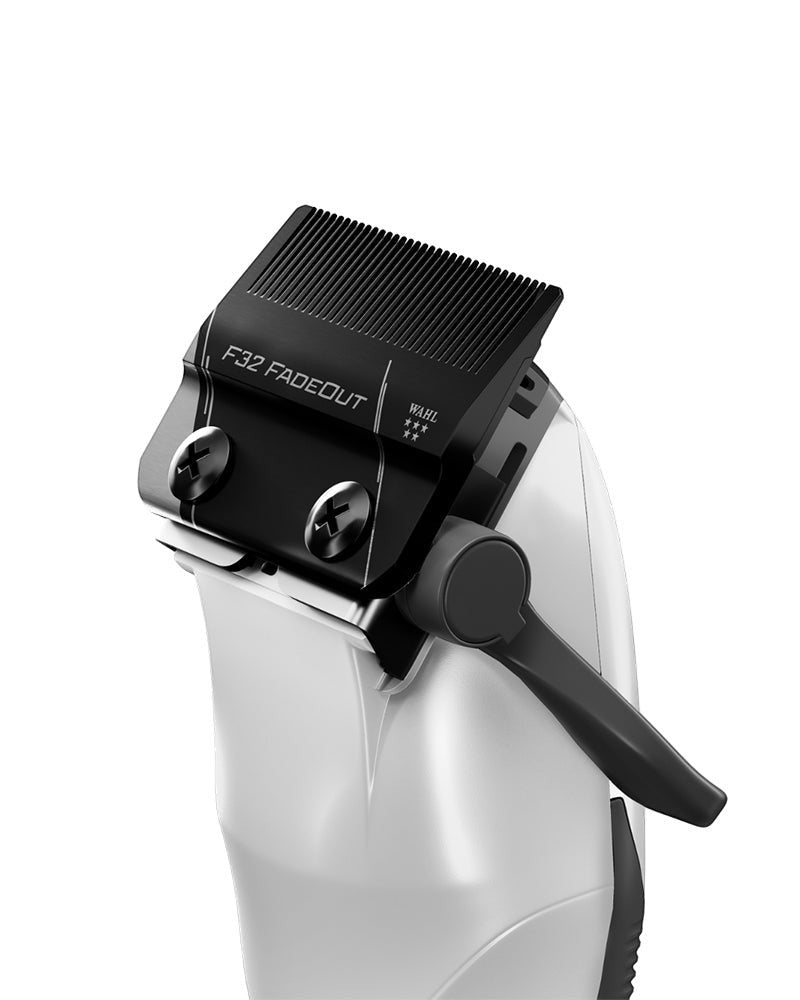 V's Barbershop Wahl 5-Star Vapor CE cordless clipper featuring a black F32 Fadeout blade and white rubberized body.
